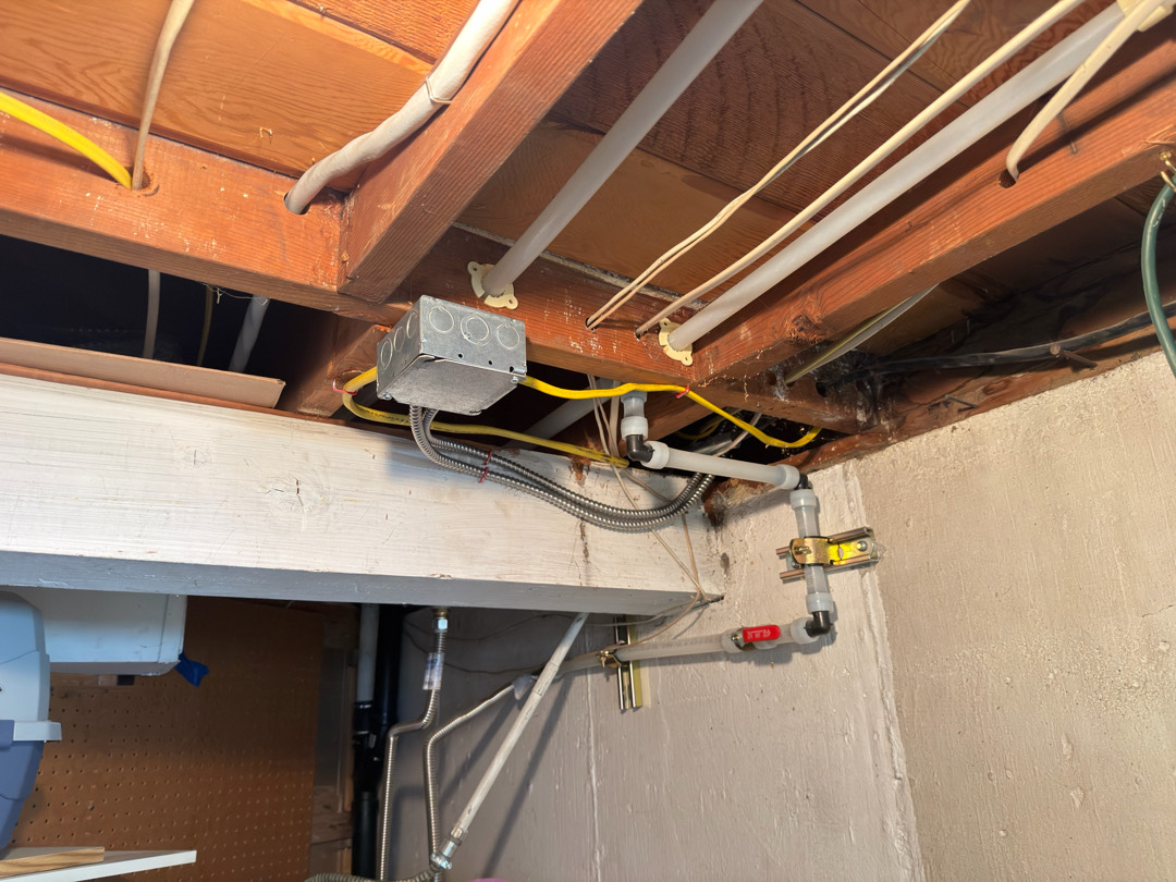 Dishwasher circuit wiring and junction box installed under floor framing in basement area Portland OR