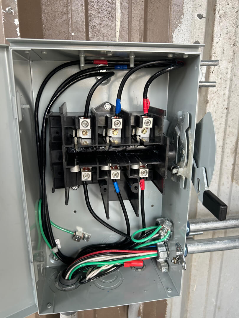 Commercial electrical disconnect box with wiring and breakers for walk-in freezer system in Portland OR