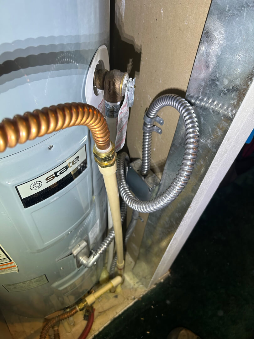 Water heater with flexible conduit loop and electrical connection for extended circuit in Mulino OR