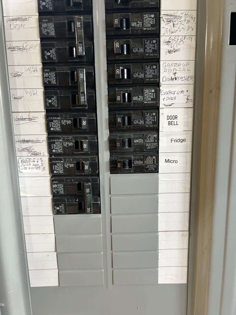 Electrical panel with labeled breakers upgraded to support two new 20-amp circuits in Portland OR