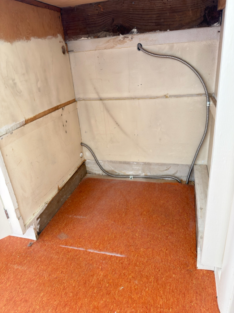 Dedicated dishwasher electrical outlet and wiring installed inside kitchen cabinet space in Portland OR