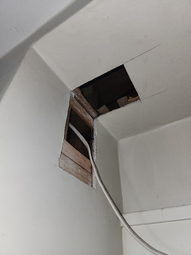 Ceiling access opening used for removal of old knob and tube wiring in Portland OR