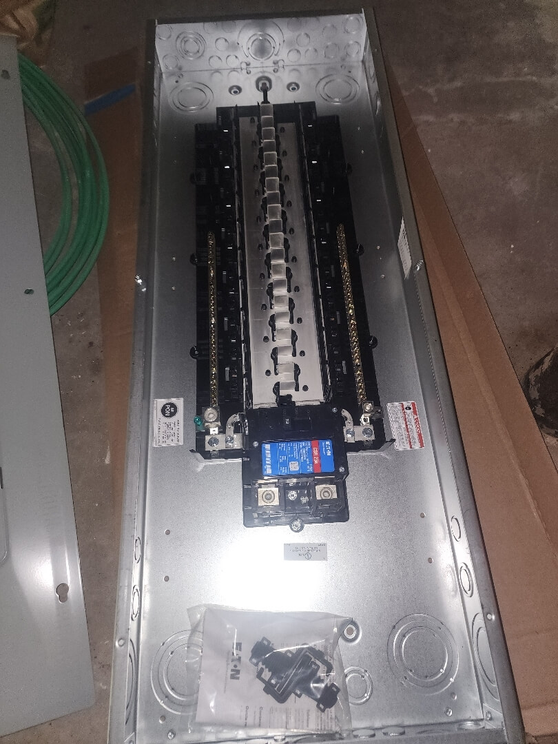 New electrical panel with organized breakers installed during knob and tube wiring replacement in Portland