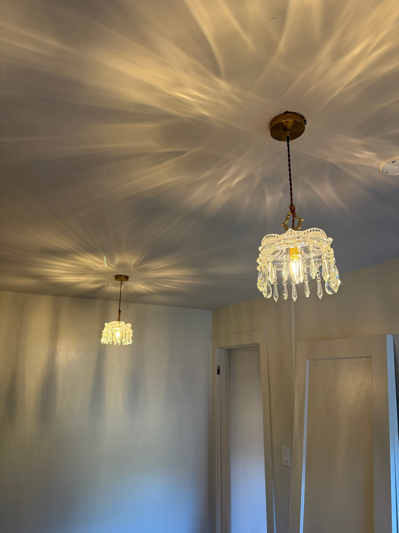New decorative ceiling light fixture installed after electrical upgrade in Portland OR