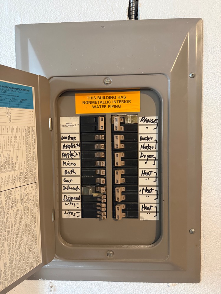 Labeled electrical panel where the new dedicated refrigerator circuit begins, Portland, OR